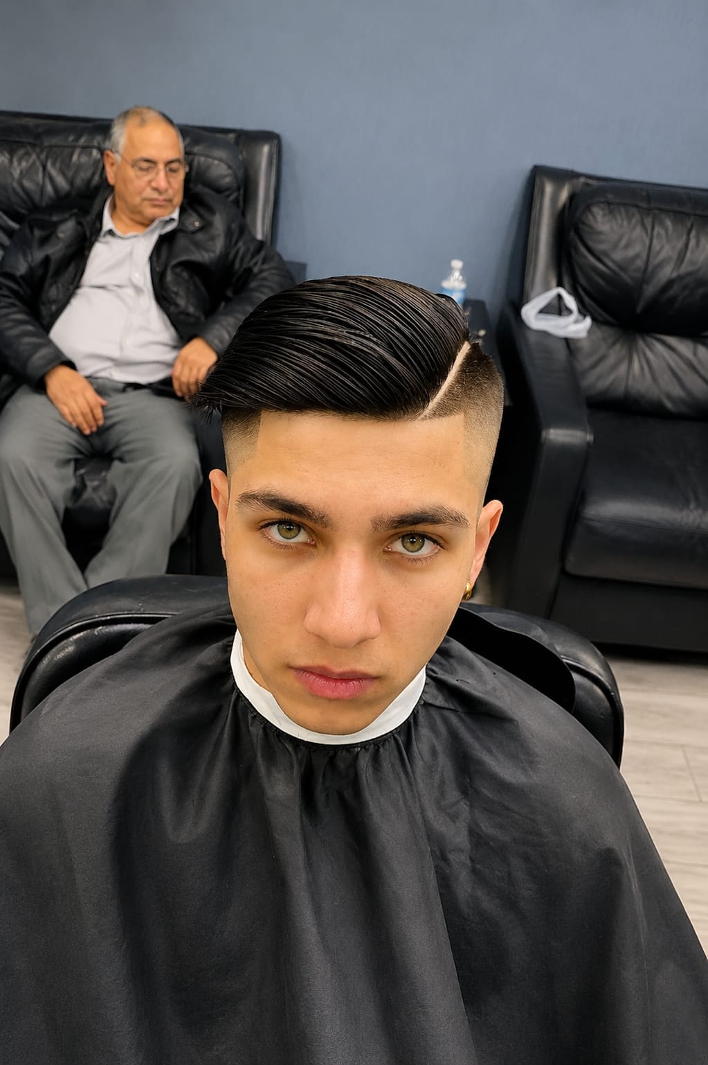 Professional fade haircut at Coney Island Barber